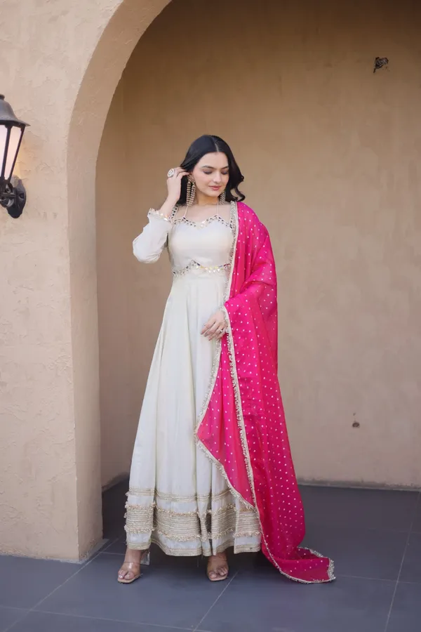 Cosmos_Lehenga_designed_with_real_mirror_and_zari_embroidered_lace_work,_giving_a_rich_and_festive_look._Comes_with_a_stitched_blouse_and_available_in_sizes_�_perfect_for_Navratri_&_celebrations.