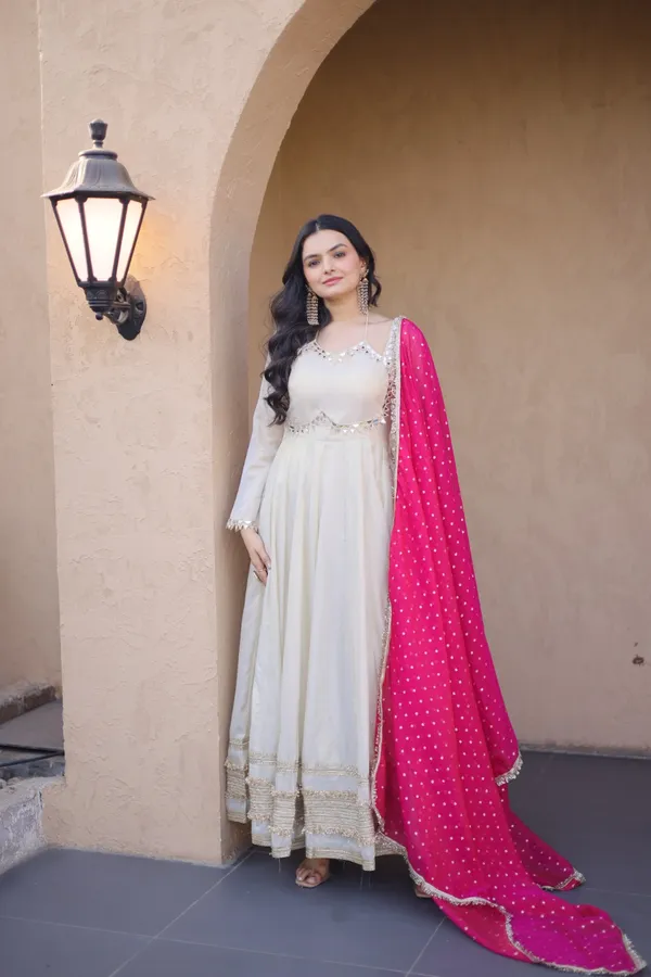 Cosmos_Lehenga_designed_with_real_mirror_and_zari_embroidered_lace_work,_giving_a_rich_and_festive_look._Comes_with_a_stitched_blouse_and_available_in_sizes_�_perfect_for_Navratri_&_celebrations.