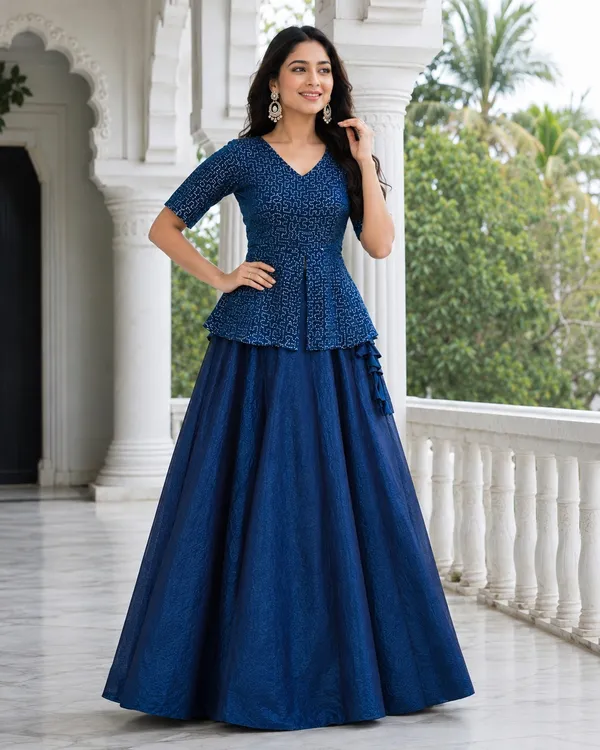 Elegant_Fendy_Satin_Lehenga_with_stylish_kali_stitching,_giving_a_beautiful_flared_look._Perfect_for_festive_&_party_wear,_paired_with_a_fully_stitched_blouse_for_a_ready-to-wear_look._?