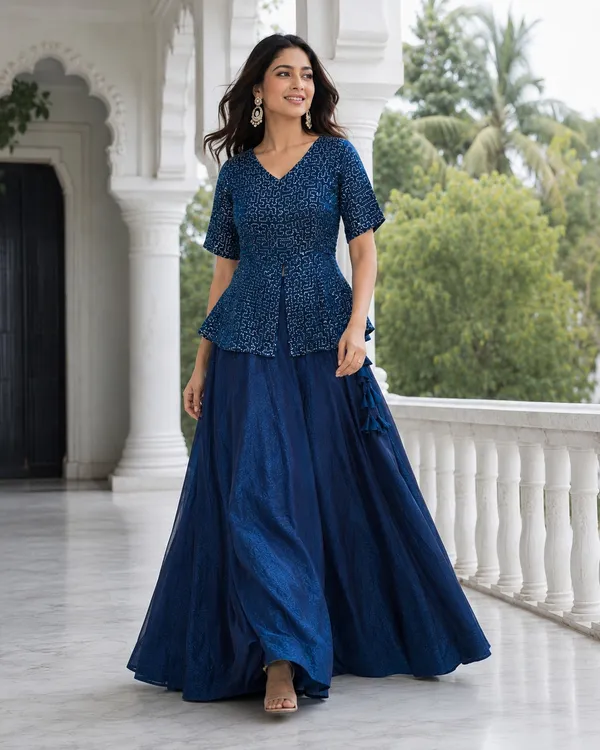Elegant_Fendy_Satin_Lehenga_with_stylish_kali_stitching,_giving_a_beautiful_flared_look._Perfect_for_festive_&_party_wear,_paired_with_a_fully_stitched_blouse_for_a_ready-to-wear_look._?