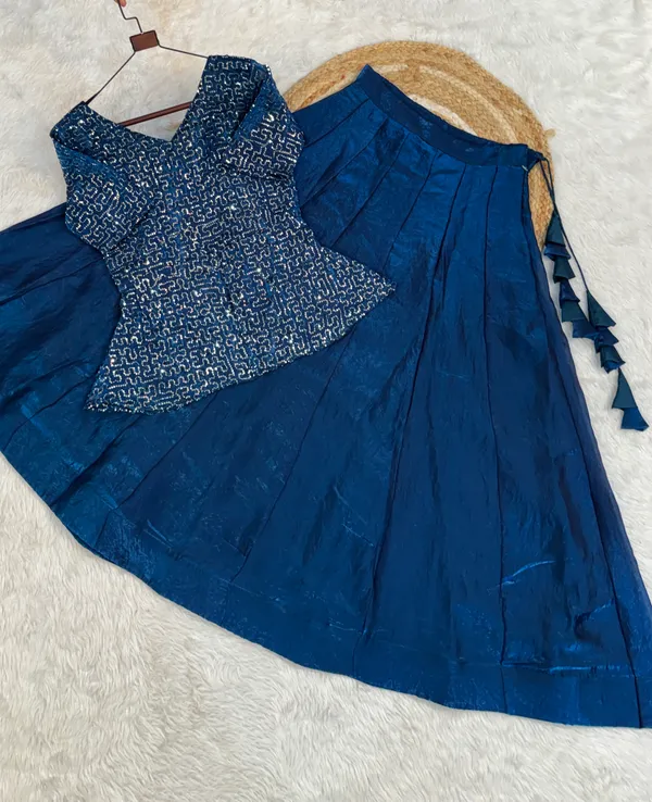 Elegant_Fendy_Satin_Lehenga_with_stylish_kali_stitching,_giving_a_beautiful_flared_look._Perfect_for_festive_&_party_wear,_paired_with_a_fully_stitched_blouse_for_a_ready-to-wear_look._?