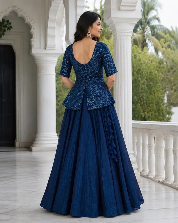 Elegant_Fendy_Satin_Lehenga_with_stylish_kali_stitching,_giving_a_beautiful_flared_look._Perfect_for_festive_&_party_wear,_paired_with_a_fully_stitched_blouse_for_a_ready-to-wear_look._?