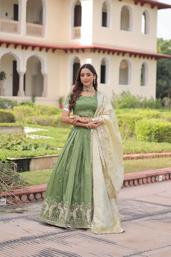 Elegant_Gold_Crush_Lehenga_adorned_with_sequins_and_zari_embroidered_work,_paired_with_an_unstitched_blouse_�_a_perfect_blend_of_shimmer_and_traditional_charm_for_festive_occasions._?