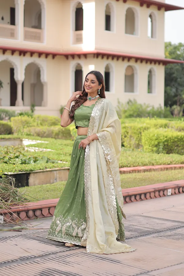 Elegant_Gold_Crush_Lehenga_adorned_with_sequins_and_zari_embroidered_work,_paired_with_an_unstitched_blouse_�_a_perfect_blend_of_shimmer_and_traditional_charm_for_festive_occasions._?