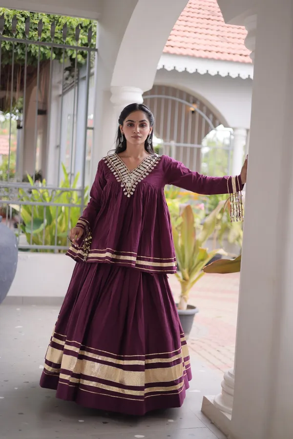 Elegant_Kora_Cotton_Lehenga_designed_with_beautiful_Zari_Patta_and_Gota_Patti_lace_work,_giving_a_rich_traditional_look._Paired_with_a_stitched_blouse_�_perfect_for_festive_and_Navratri_wear._?