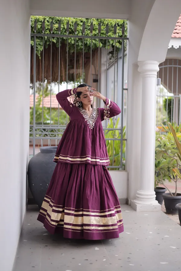 Elegant_Kora_Cotton_Lehenga_designed_with_beautiful_Zari_Patta_and_Gota_Patti_lace_work,_giving_a_rich_traditional_look._Paired_with_a_stitched_blouse_�_perfect_for_festive_and_Navratri_wear._?