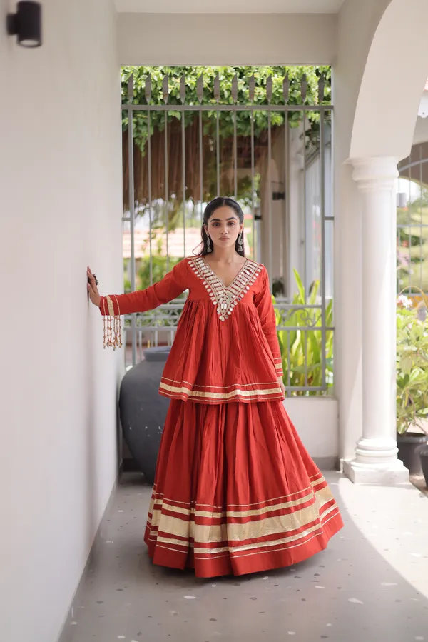 Elegant_Kora_Cotton_Lehenga_designed_with_beautiful_Zari_Patta_and_Gota_Patti_lace_work,_giving_a_rich_traditional_look._Paired_with_a_stitched_blouse_�_perfect_for_festive_and_Navratri_wear._?