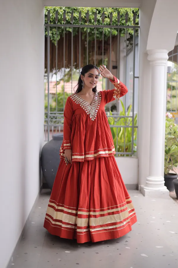 Elegant_Kora_Cotton_Lehenga_designed_with_beautiful_Zari_Patta_and_Gota_Patti_lace_work,_giving_a_rich_traditional_look._Paired_with_a_stitched_blouse_�_perfect_for_festive_and_Navratri_wear._?