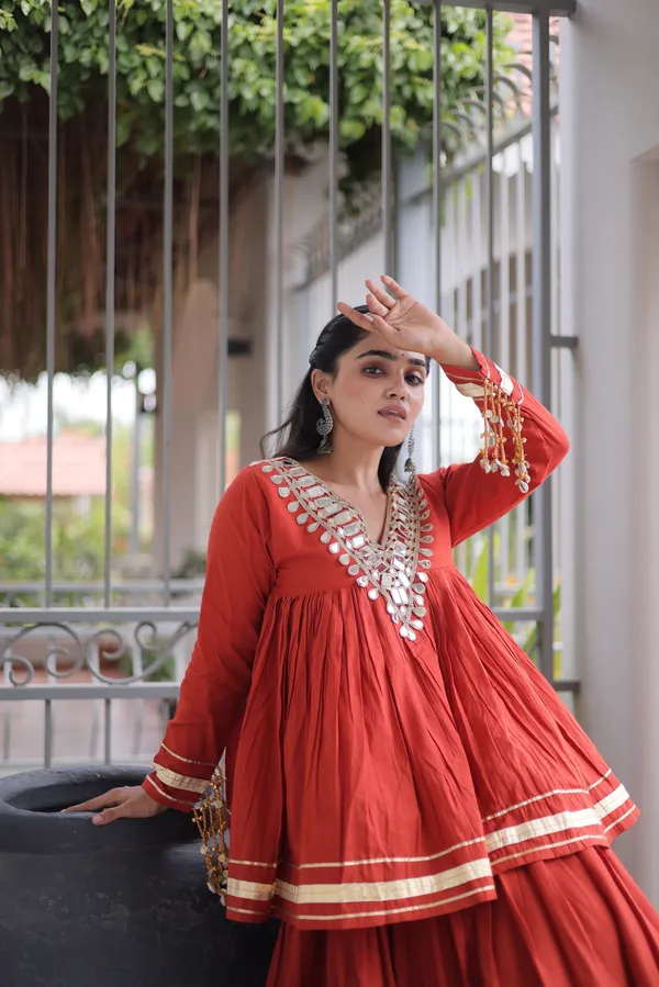 Elegant_Kora_Cotton_Lehenga_designed_with_beautiful_Zari_Patta_and_Gota_Patti_lace_work,_giving_a_rich_traditional_look._Paired_with_a_stitched_blouse_�_perfect_for_festive_and_Navratri_wear._?
