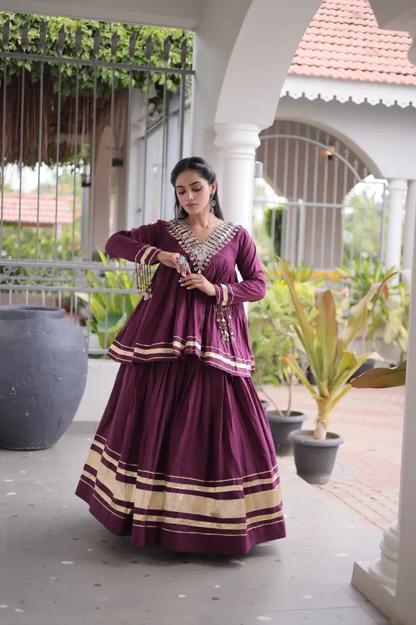 Elegant_Kora_Cotton_Lehenga_designed_with_beautiful_Zari_Patta_and_Gota_Patti_lace_work,_giving_a_rich_traditional_look._Paired_with_a_stitched_blouse_�_perfect_for_festive_and_Navratri_wear._?