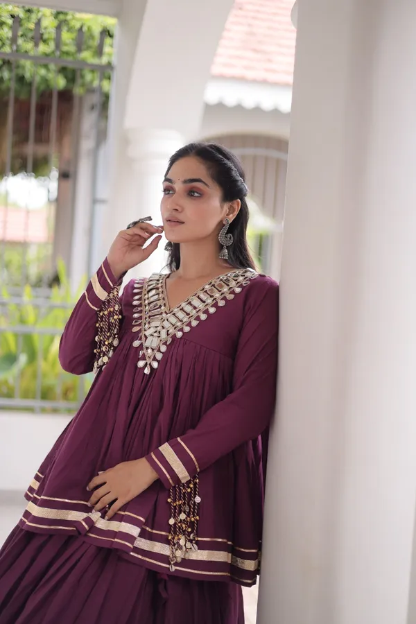 Elegant_Kora_Cotton_Lehenga_designed_with_beautiful_Zari_Patta_and_Gota_Patti_lace_work,_giving_a_rich_traditional_look._Paired_with_a_stitched_blouse_�_perfect_for_festive_and_Navratri_wear._?