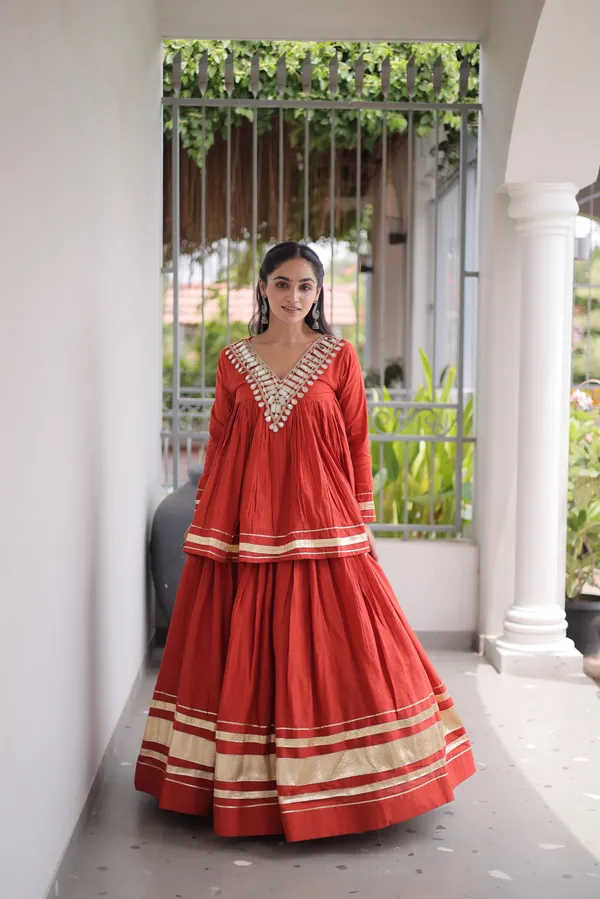 Elegant_Kora_Cotton_Lehenga_designed_with_beautiful_Zari_Patta_and_Gota_Patti_lace_work,_giving_a_rich_traditional_look._Paired_with_a_stitched_blouse_�_perfect_for_festive_and_Navratri_wear._?