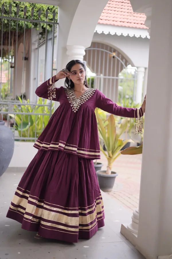 Elegant_Kora_Cotton_Lehenga_designed_with_beautiful_Zari_Patta_and_Gota_Patti_lace_work,_giving_a_rich_traditional_look._Paired_with_a_stitched_blouse_�_perfect_for_festive_and_Navratri_wear._?