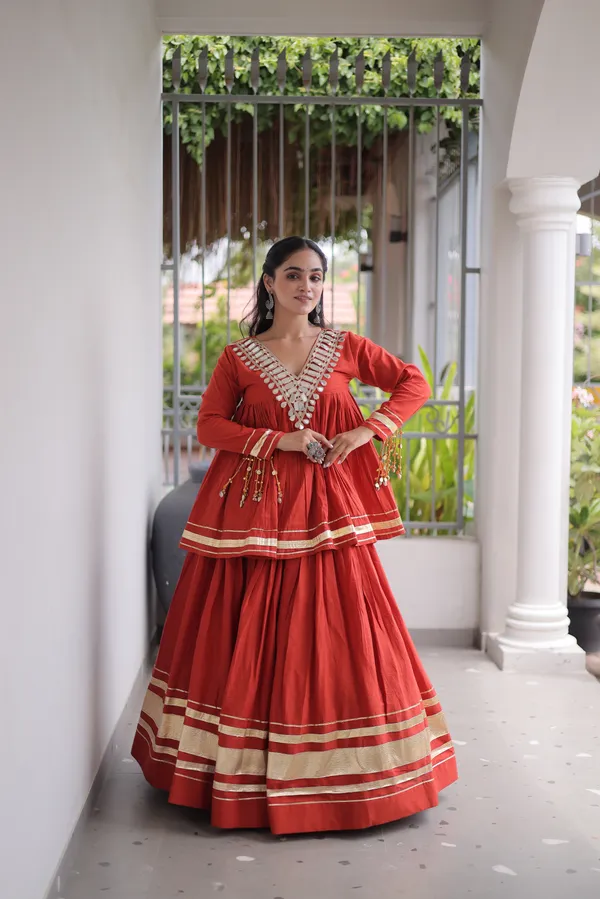 Elegant_Kora_Cotton_Lehenga_designed_with_beautiful_Zari_Patta_and_Gota_Patti_lace_work,_giving_a_rich_traditional_look._Paired_with_a_stitched_blouse_�_perfect_for_festive_and_Navratri_wear._?