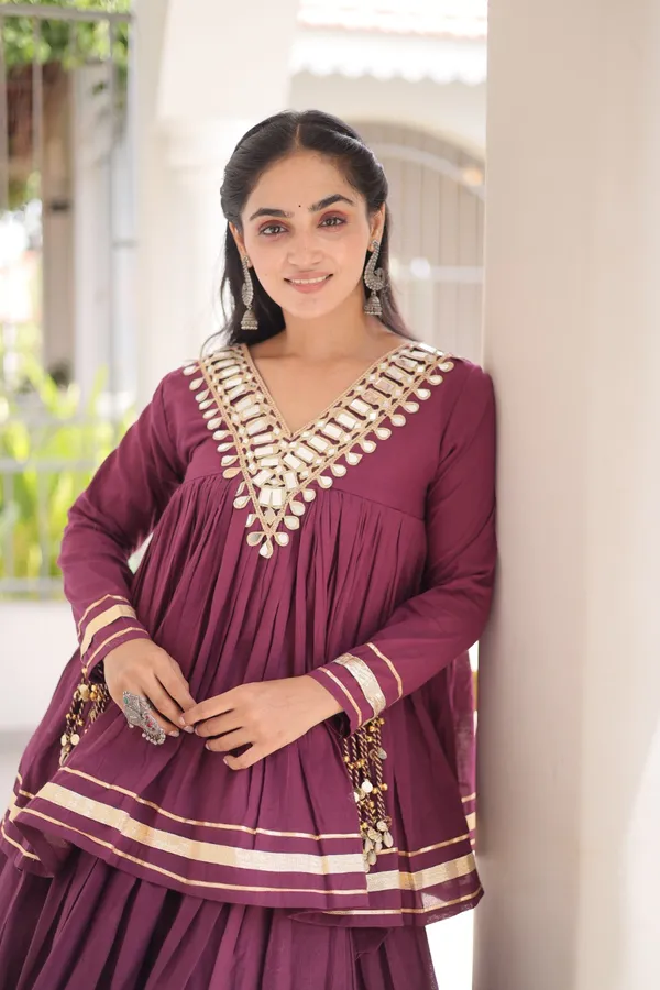 Elegant_Kora_Cotton_Lehenga_designed_with_beautiful_Zari_Patta_and_Gota_Patti_lace_work,_giving_a_rich_traditional_look._Paired_with_a_stitched_blouse_�_perfect_for_festive_and_Navratri_wear._?