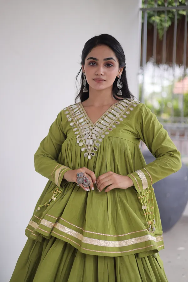 Elegant_Kora_Cotton_Lehenga_designed_with_beautiful_Zari_Patta_and_Gota_Patti_lace_work,_giving_a_rich_traditional_look._Paired_with_a_stitched_blouse_�_perfect_for_festive_and_Navratri_wear._?