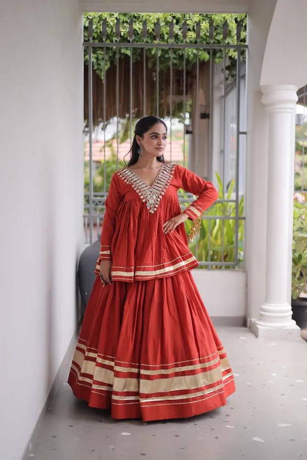 Elegant_Kora_Cotton_Lehenga_designed_with_beautiful_Zari_Patta_and_Gota_Patti_lace_work,_giving_a_rich_traditional_look._Paired_with_a_stitched_blouse_�_perfect_for_festive_and_Navratri_wear._?