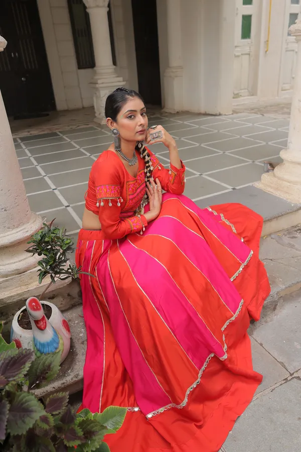 Roman-inspired_Lehenga_featuring_an_attractive_combination_of_mirror_lace_embellished_work,_paired_with_fully_stitched_lehenga_&_blouse_�_a_vibrant_and_eye-catching_choice_for_festive_and_Navratri_looks.