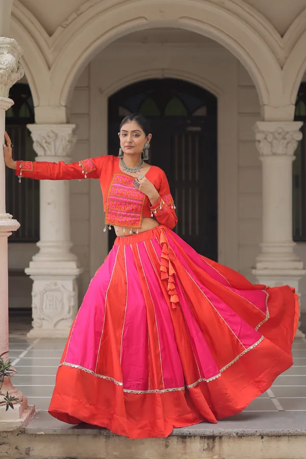 Roman-inspired_Lehenga_featuring_an_attractive_combination_of_mirror_lace_embellished_work,_paired_with_fully_stitched_lehenga_&_blouse_�_a_vibrant_and_eye-catching_choice_for_festive_and_Navratri_looks.