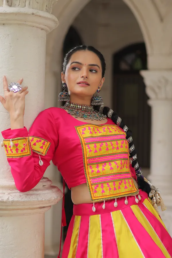 Roman-inspired__Lehenga_featuring_an_attractive_combination_of_mirror_lace_embellished_work,_paired_with_fully_stitched_lehenga_&_blouse_�_a_vibrant_and_eye-catching_choice_for_festive_and_Navratri_looks.