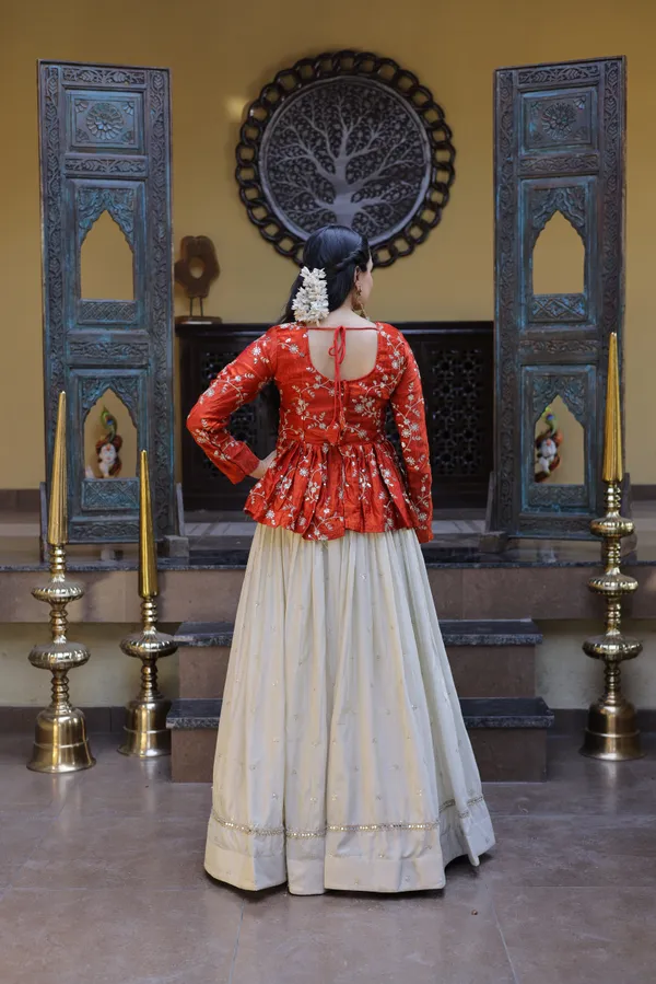 Silk_Lehenga_with_sequins,_zari_&_mirror_embellished_work,_paired_with_a_stylish_blouse._Gives_a_beautiful_flared_look_�_perfect_for_parties_&_festive_wear._Unstitched_blouse_included._?