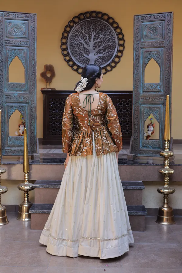 Silk_Lehenga_with_sequins,_zari_&_mirror_embellished_work,_paired_with_a_stylish_blouse._Gives_a_beautiful_flared_look_�_perfect_for_parties_&_festive_wear._Unstitched_blouse_included._?