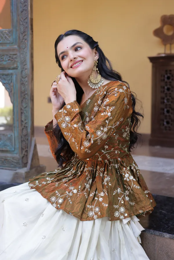 Silk_Lehenga_with_sequins,_zari_&_mirror_embellished_work,_paired_with_a_stylish_blouse._Gives_a_beautiful_flared_look_�_perfect_for_parties_&_festive_wear._Unstitched_blouse_included._?