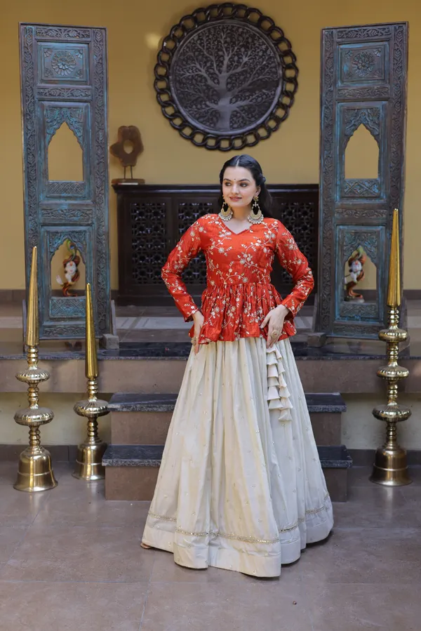 Silk_Lehenga_with_sequins,_zari_&_mirror_embellished_work,_paired_with_a_stylish_blouse._Gives_a_beautiful_flared_look_�_perfect_for_parties_&_festive_wear._Unstitched_blouse_included._?