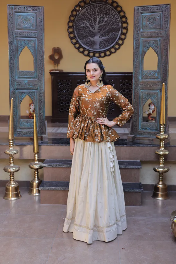 Silk_Lehenga_with_sequins,_zari_&_mirror_embellished_work,_paired_with_a_stylish_blouse._Gives_a_beautiful_flared_look_�_perfect_for_parties_&_festive_wear._Unstitched_blouse_included._?