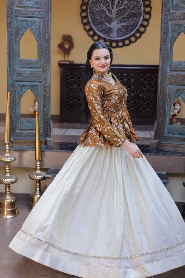 Silk_Lehenga_with_sequins,_zari_&_mirror_embellished_work,_paired_with_a_stylish_blouse._Gives_a_beautiful_flared_look_�_perfect_for_parties_&_festive_wear._Unstitched_blouse_included._?