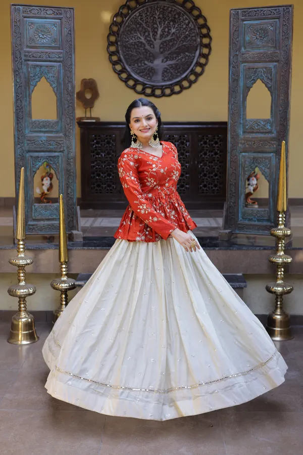 Silk_Lehenga_with_sequins,_zari_&_mirror_embellished_work,_paired_with_a_stylish_blouse._Gives_a_beautiful_flared_look_�_perfect_for_parties_&_festive_wear._Unstitched_blouse_included._?