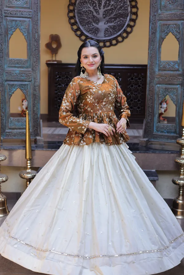 Silk_Lehenga_with_sequins,_zari_&_mirror_embellished_work,_paired_with_a_stylish_blouse._Gives_a_beautiful_flared_look_�_perfect_for_parties_&_festive_wear._Unstitched_blouse_included._?
