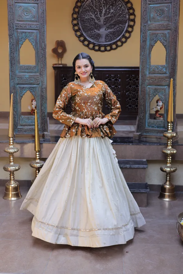 Silk_Lehenga_with_sequins,_zari_&_mirror_embellished_work,_paired_with_a_stylish_blouse._Gives_a_beautiful_flared_look_�_perfect_for_parties_&_festive_wear._Unstitched_blouse_included._?
