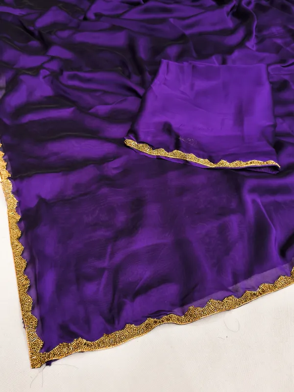New_Party_Wear_Rangoli_Silk_Violet_color_saree_with_Blouse_and_stone_lace_Border