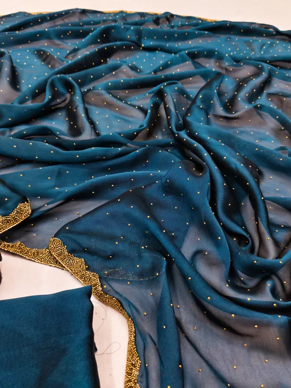 Premium_Teal_Blue_Rangoli_Silk_Saree_with_Golden_Pearl_Work_&_Heavy_Designer_Lace_Border