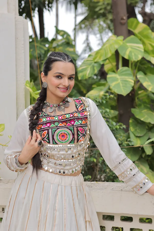 Celebrate_true_Navratri_vibes_with_this_traditional_&_spiritual_outfit_that_beautifully_blends_festive_fun_with_cultural_charm._Choose_from_vibrant_colors_in_this_Lehenga_with_Top,_perfect_for_dancing,_devotion,_and_the_joy_of_togetherness._Comes_with_fully_stitched_lehenga_&_blouse_for_a_ready-to-wear_festive_look._???