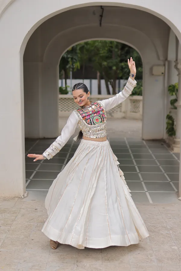 Celebrate_true_Navratri_vibes_with_this_traditional_&_spiritual_outfit_that_beautifully_blends_festive_fun_with_cultural_charm._Choose_from_vibrant_colors_in_this_Lehenga_with_Top,_perfect_for_dancing,_devotion,_and_the_joy_of_togetherness._Comes_with_fully_stitched_lehenga_&_blouse_for_a_ready-to-wear_festive_look._???