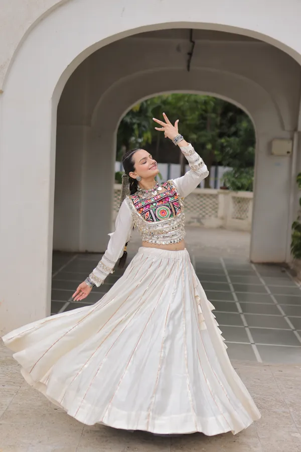 Celebrate_true_Navratri_vibes_with_this_traditional_&_spiritual_outfit_that_beautifully_blends_festive_fun_with_cultural_charm._Choose_from_vibrant_colors_in_this_Lehenga_with_Top,_perfect_for_dancing,_devotion,_and_the_joy_of_togetherness._Comes_with_fully_stitched_lehenga_&_blouse_for_a_ready-to-wear_festive_look._???