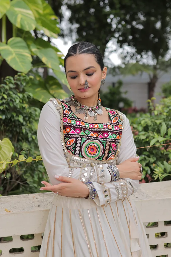Celebrate_true_Navratri_vibes_with_this_traditional_&_spiritual_outfit_that_beautifully_blends_festive_fun_with_cultural_charm._Choose_from_vibrant_colors_in_this_Lehenga_with_Top,_perfect_for_dancing,_devotion,_and_the_joy_of_togetherness._Comes_with_fully_stitched_lehenga_&_blouse_for_a_ready-to-wear_festive_look._???