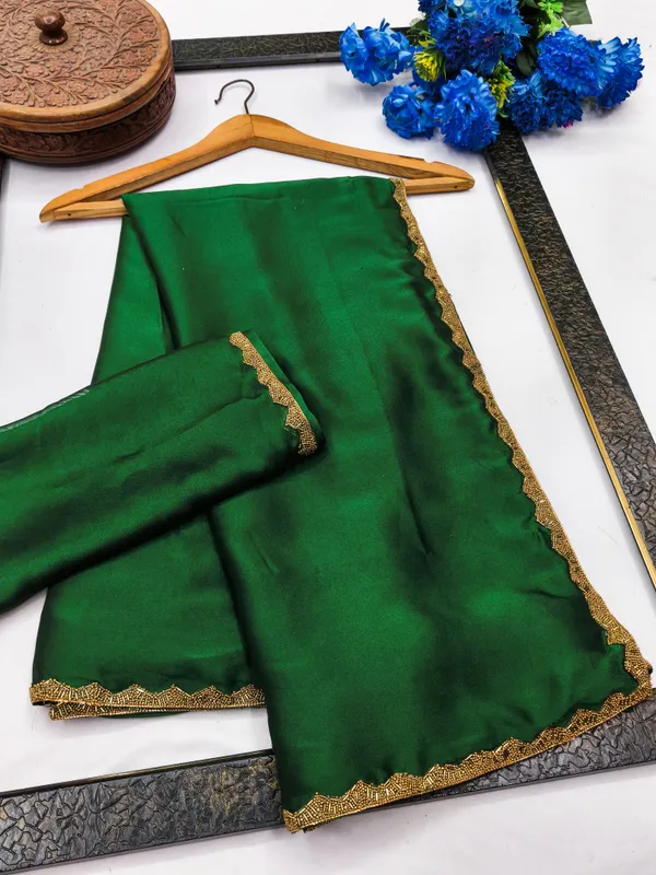 New_Party_Wear_Rangoli_Silk_Green_color_saree_with_Blouse_and_stone_lace_Border