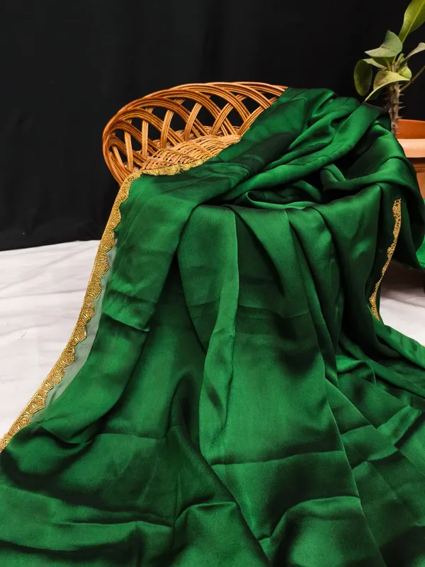 New_Party_Wear_Rangoli_Silk_Green_color_saree_with_Blouse_and_stone_lace_Border