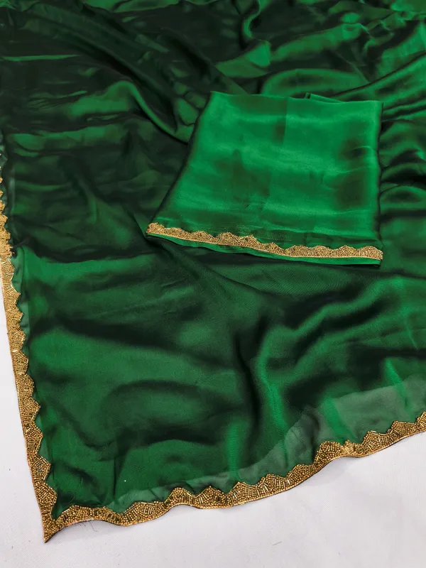 New_Party_Wear_Rangoli_Silk_Green_color_saree_with_Blouse_and_stone_lace_Border