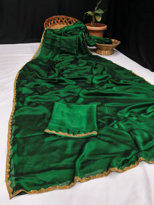 New_Party_Wear_Rangoli_Silk_Green_color_saree_with_Blouse_and_stone_lace_Border