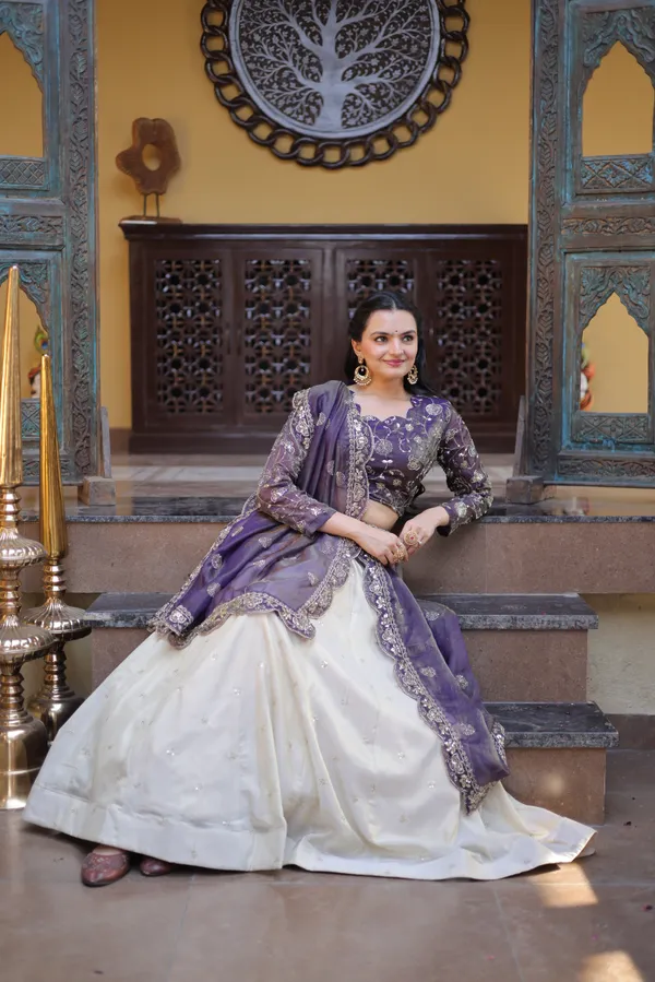 beautifully_designed_with_zari_&_sequins_embroidered_work,_giving_a_rich_and_elegant_look._Perfect_for_festive_&_party_wear._Comes_with_an_unstitched_blouse_for_a_customized_fit.