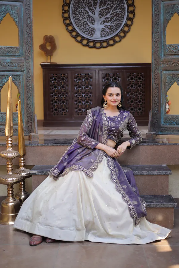 beautifully_designed_with_zari_&_sequins_embroidered_work,_giving_a_rich_and_elegant_look._Perfect_for_festive_&_party_wear._Comes_with_an_unstitched_blouse_for_a_customized_fit.
