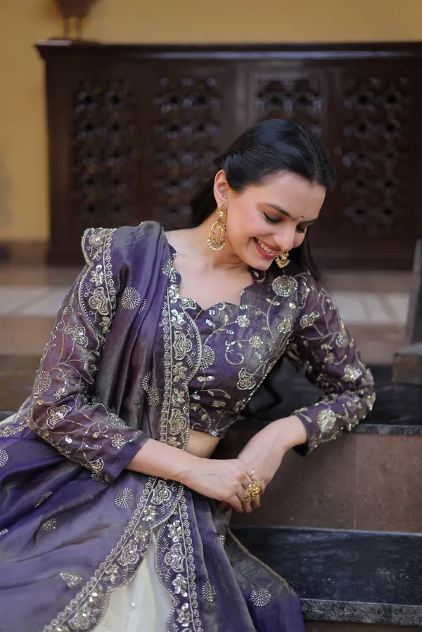 beautifully_designed_with_zari_&_sequins_embroidered_work,_giving_a_rich_and_elegant_look._Perfect_for_festive_&_party_wear._Comes_with_an_unstitched_blouse_for_a_customized_fit.