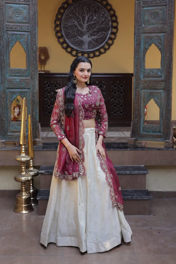 beautifully_designed_with_zari_&_sequins_embroidered_work,_giving_a_rich_and_elegant_look._Perfect_for_festive_&_party_wear._Comes_with_an_unstitched_blouse_for_a_customized_fit.