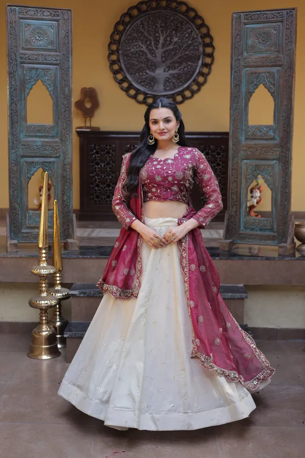 beautifully_designed_with_zari_&_sequins_embroidered_work,_giving_a_rich_and_elegant_look._Perfect_for_festive_&_party_wear._Comes_with_an_unstitched_blouse_for_a_customized_fit.