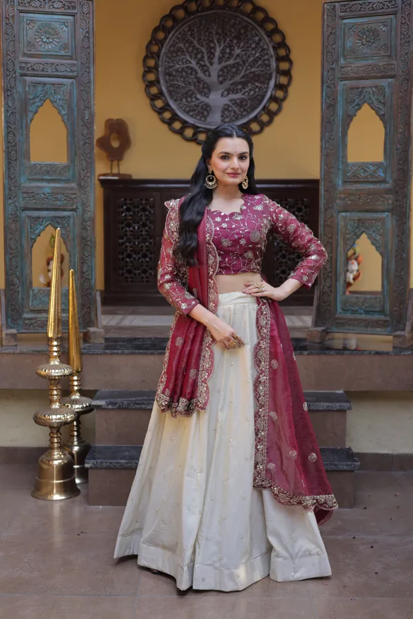 beautifully_designed_with_zari_&_sequins_embroidered_work,_giving_a_rich_and_elegant_look._Perfect_for_festive_&_party_wear._Comes_with_an_unstitched_blouse_for_a_customized_fit.