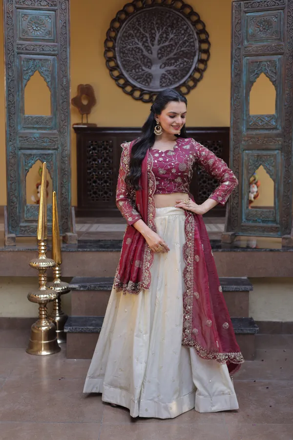 beautifully_designed_with_zari_&_sequins_embroidered_work,_giving_a_rich_and_elegant_look._Perfect_for_festive_&_party_wear._Comes_with_an_unstitched_blouse_for_a_customized_fit.